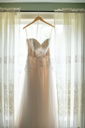 white sweetheart neckline tulle skirt spaghetti strap wedding gown